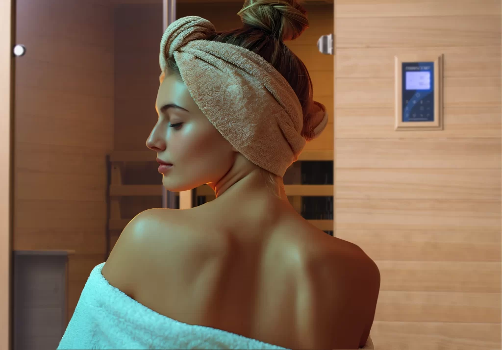 Woman in front of the Transcend Sauna